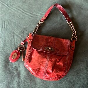 Red Shoulder Bag with Chain Strap and Flap Closure